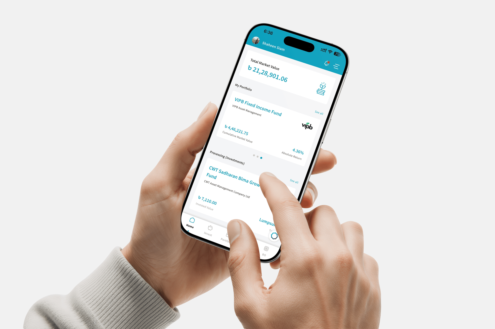 A hand holding a phone showing the Bini app portfolio